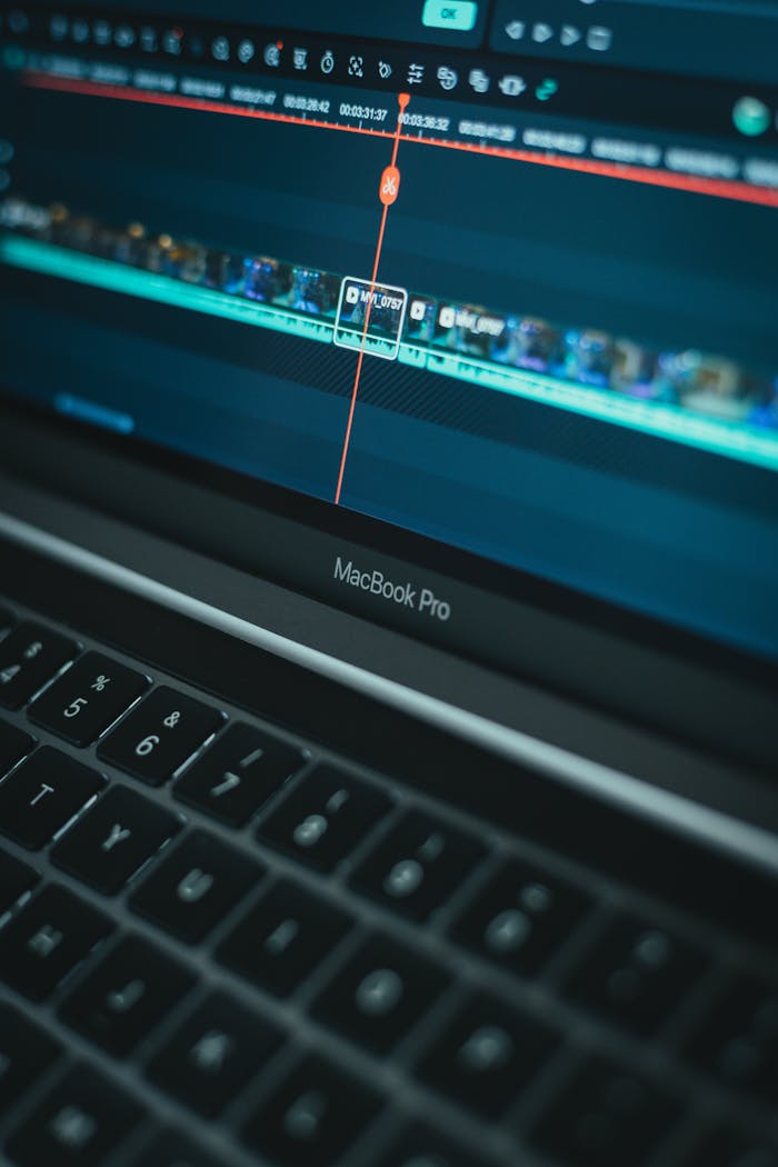 hero-img-02 Detailed view of video editing software on a MacBook Pro laptop computer.