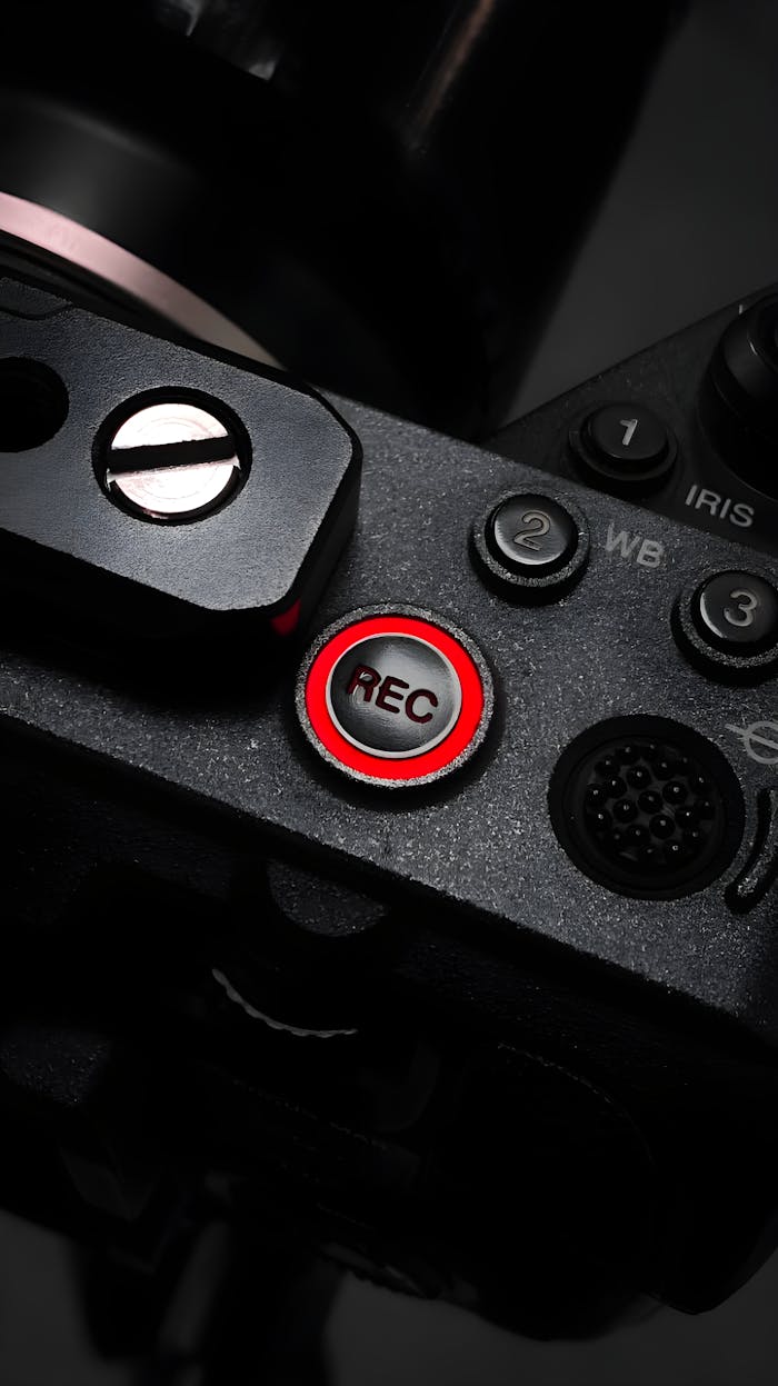 gallery-2 Close-up of a camera REC button highlighting its design and functionality in low light conditions